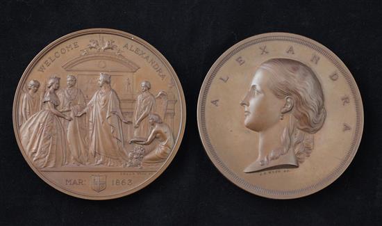 A pair of bronze medals by J. S. Wyon, 1863, commemorating the London visit of Princess Alexandra, diameter 76mm, case at fault